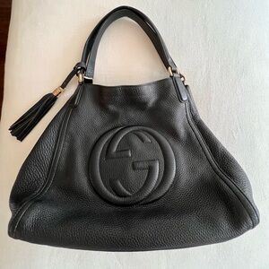 Gucci Soho Interlocking G handbag in black leather.